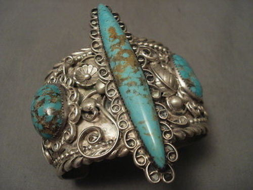 ONE OF THE BEST AND LARGEST VINTAGE NAVAJO #8 TURQUOISE SILVER BRACELET