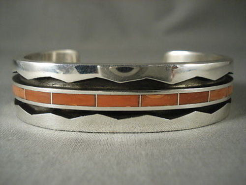 IMPORTANT MODERNISTIC ZUNI CORAL SILVER WAVE 94 GRAM BRACELET