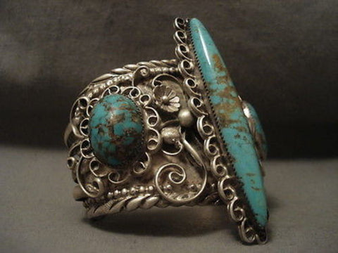ONE OF THE BEST AND LARGEST VINTAGE NAVAJO #8 TURQUOISE SILVER BRACELET