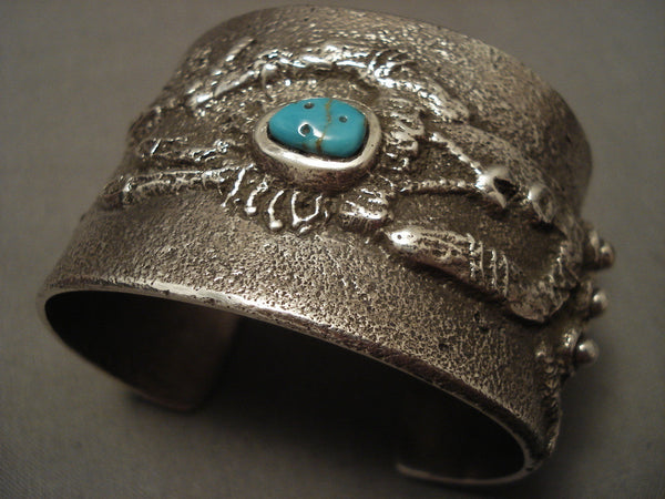 Important Navajo 'Dancing Yei Turquoise Face' Silver Bracelet
