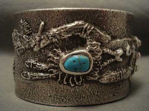 Important Navajo 'Dancing Yei Turquoise Face' Silver Bracelet