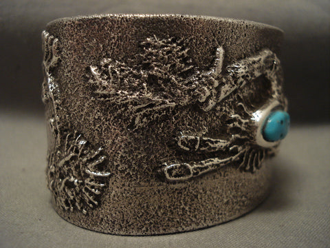 Important Navajo 'Dancing Yei Turquoise Face' Silver Bracelet