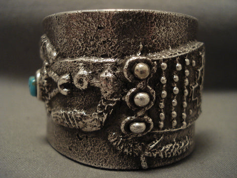 Important Navajo 'Dancing Yei Turquoise Face' Silver Bracelet
